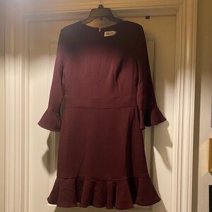 NWT Stylish With Sleeve and Hem Flounce in Beautiful Wine Color!